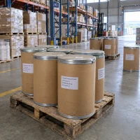 2-naphthoxyacetic-acid-cas-120-23-0-25kg-cardboard-fiber-drum Multiple cardboard fiber drums with metal lids labeled 2-naphthoxyacetic acid (CAS 120-23-0), net weight 25 kg, arranged on a wooden pallet