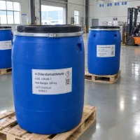 4-chlorobenzaldehyde-200kg-blue-drums-pallets 4-Chlorobenzaldehyde (CAS 104-88-1) in 200 kg blue plastic drums with hazard labels on pallets in a warehouse