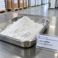 agomelatine-powder-stainless-tray-display Agomelatine (CAS 138112-76-2) white powder pile in a stainless steel tray with a UAT Chemical sign card beside it