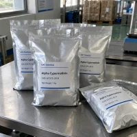 alpha-cypermethrin-cas-67375-30-8-aluminum-foil-bags-1kg Alpha cypermethrin (CAS No. 67375-30-8) sample packed in 1 kg aluminum foil bags on a stainless steel workbench.
