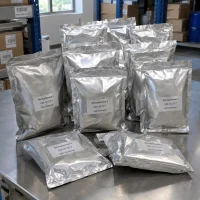 Benzophenone-3 (CAS 131-57-7) in sealed aluminum foil bags on a stainless steel table