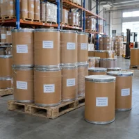 Benzophenone-3 (CAS 131-57-7) packed in fiber drums stacked on a pallet in a warehouse
