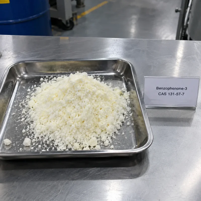 White to pale yellow powder of Benzophenone-3 (CAS 131-57-7) on a stainless steel tray