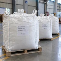 White FIBC bulk bags labeled Boron Nitride CAS 10043-11-5 with 500 kg net weight on wooden pallets in a warehouse.