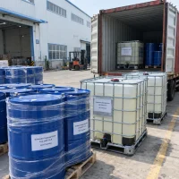 Butanediol diglycidyl ether CAS 2425-79-8 in drums and IBC totes being loaded into a container truck