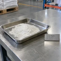 White Calcium Phytate powder CAS 3615-82-5 in a stainless steel tray with a product label on a metal table.