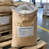 An open 25kg brown paper bag of Carboxymethyl Cellulose CMC CAS 9004-32-4 showing the white powder inside.