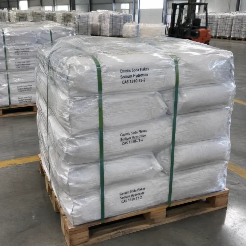 Shrink-wrapped pallet of 25kg white bags of Caustic Soda Flakes Sodium Hydroxide CAS 1310-73-2 secured with straps in a warehouse with a forklift behind.