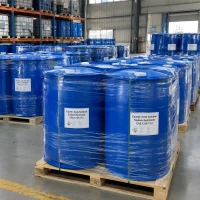 caustic-soda-solution-cas-1310-73-2-blue-plastic-drums-pallet Blue plastic drums of Caustic Soda Solution Sodium Hydroxide CAS 1310-73-2 shrink-wrapped on wooden pallets in a warehouse.