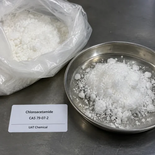White crystalline chloroacetamide powder (CAS 79-07-2) in a stainless steel dish and a plastic bag