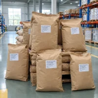chrome-free-zeolite-tanning-agent-cas-68989-22-0-25kg-paper-bags Stacked 25kg brown paper bags of Chrome-free Zeolite Tanning Agent CAS 68989-22-0 on wooden pallets in a warehouse.