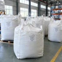 chrome-free-zeolite-tanning-agent-cas-68989-22-0-650kg-fibc-bags White FIBC bulk bags labeled Chrome-free Zeolite Tanning Agent CAS 68989-22-0 with 650 kg net weight on wooden pallets in a warehouse.
