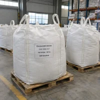 White FIBC bulk bags labeled Chromium(III) Chloride CAS 10025-73-7 with 500 kg net weight on wooden pallets in a warehouse.