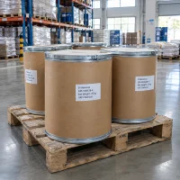 Several 25kg fiber drums of D-Mannose CAS 3458-28-4 on a wooden pallet in a warehouse storage area.