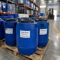 Blue plastic drums of diethyl sulfate (CAS 64-67-5) on wooden pallets in a warehouse