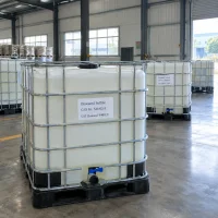diisoamyl-sulfide-cas-544-02-5-ibc-tote-container White IBC tote tank of diisoamyl sulfide (CAS No. 544-02-5) with steel cage and bottom discharge valve in a warehouse