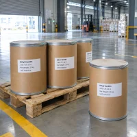 Four 25kg fiber drums of Ethyl Vanillin CAS 121-32-4 on a wooden pallet in a warehouse.