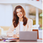 Happy female professional client testimonial success story with laptop recommending UATChem quality products and services
