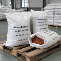 ferrous-fumarate-25kg-woven-bags-open-bag-pallet Ferrous fumarate (CAS 141-01-5) in 25 kg white woven bags on a pallet, one open bag showing red-brown powder