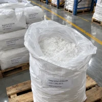 magnesium-chloride-cas-7786-30-3-powder-open-bag Magnesium chloride CAS 7786-30-3 white powder in an open woven bag with inner PE liner in warehouse