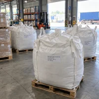 magnesium-sulfate-heptahydrate-cas-10034-99-8-1000kg-fibc-bulk-bag White woven polypropylene FIBC bulk bags of magnesium sulfate heptahydrate (CAS 10034-99-8), net weight 1000 kg each, on wooden pallets in a warehouse