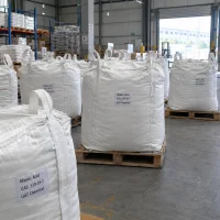 Maleic Acid (CAS 110-16-7) in white bulk bags with lifting loops on wooden pallets in a warehouse