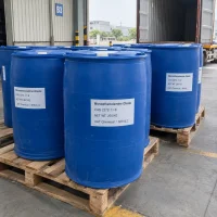 Blue plastic drums of monoethanolamine oleate (CAS 2272-11-9), 200 kg each, on wooden pallets near a shipping container