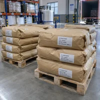 O-Toluic Acid CAS 118-90-1 25kg paper bags stacked on pallets in factory warehouse