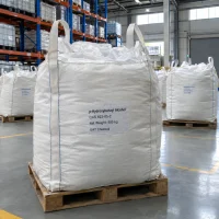 p-hydroxybenzyl-alcohol-cas-623-05-2-500kg-bulk-bags-warehouse White bulk bag (FIBC) of p-Hydroxybenzyl Alcohol (CAS 623-05-2), 500 kg, on a wooden pallet in a chemical warehouse