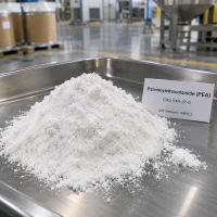 Palmitoylethanolamide (PEA, CAS 544-31-0) white powder pile in a stainless steel tray with a product sign card