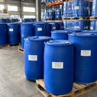 Blue plastic drums labeled Polymaleic Acid CAS 26099-09-2 on wooden pallets in a warehouse with shrink-wrapped drum stacks on racks behind.