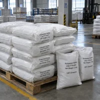 Potassium sulfate (CAS 7778-80-5) packed in 25 kg white woven bags stacked on wooden pallets in a warehouse.