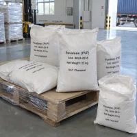 Povidone (PVP, CAS 9003-39-8) in 25 kg white woven bags on a wrapped pallet, open bag showing white powder