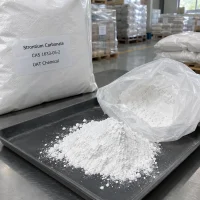 strontium-carbonate-cas-1633-05-2-white-powder-sample Strontium carbonate CAS 1633-05-2 white powder sample on tray with packed bags in warehouse